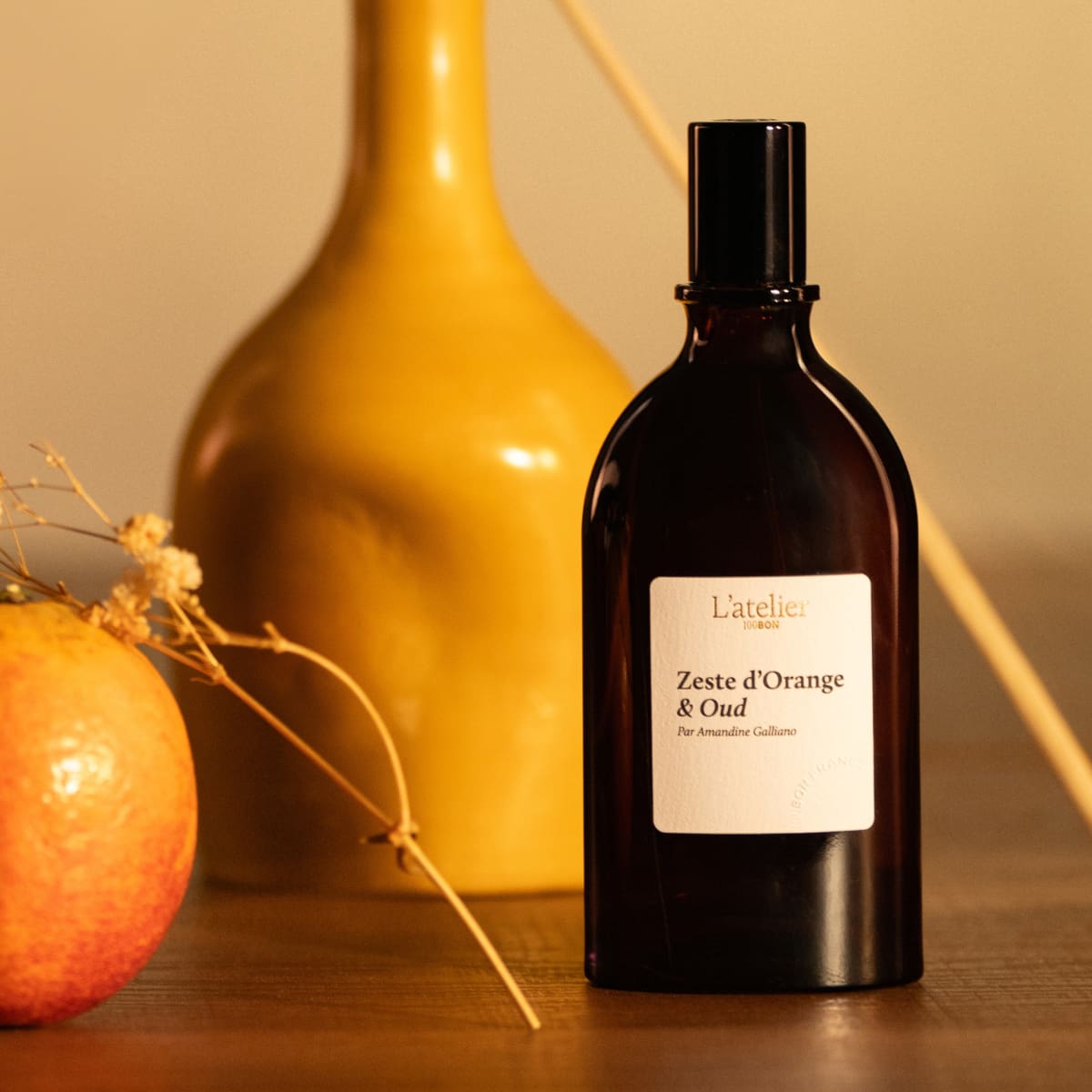 Flacon Eau de parfum Zeste d'orange et Oud et fleur séchée 